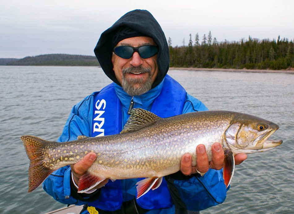 Ang holding Coastal Brook Trout