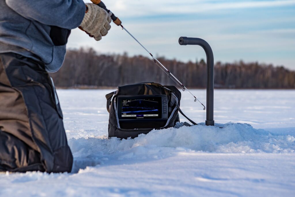 An angler getting ready to set the hook on a midday walleye